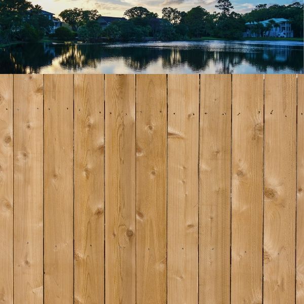 fence in obstructing the view of a lake